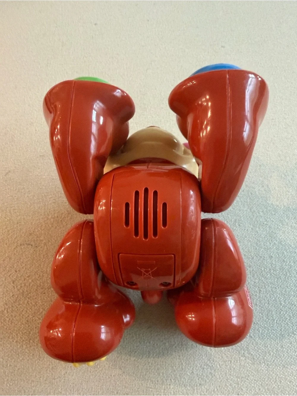 Fisher-Price Red Monkey Push Toy with Blue and Green Rollers